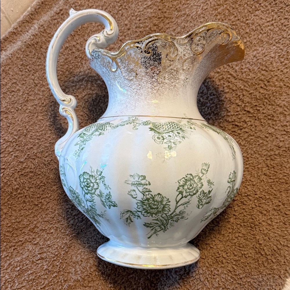 Elegant antique ceramic pitcher
